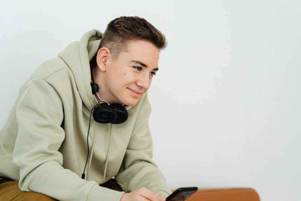 Young male smiling in his newcastle SIL Home